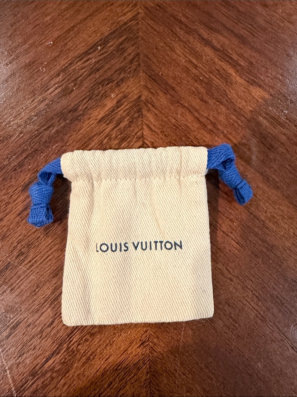 Louis Vuitton Cream Pouch with Blue Drawstrings for jewelry